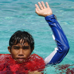 Lifeguard signals one arm up help me