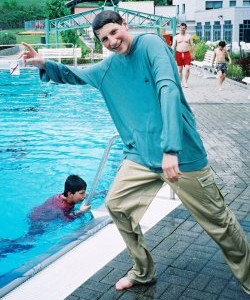 power training in pool with red anorak