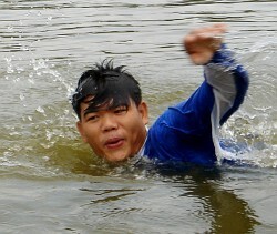Swim coach in hoodie
